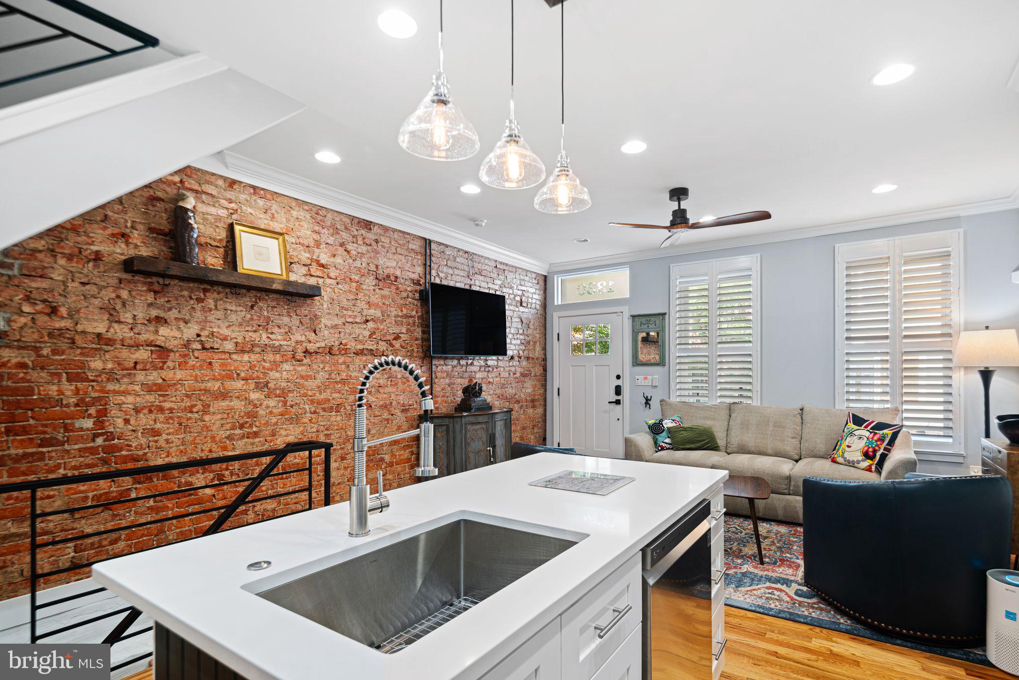 1330 South 16th Street Philadelphia, PA 19146 - Photo 5 of 37 a kitchen with a stove and a sink