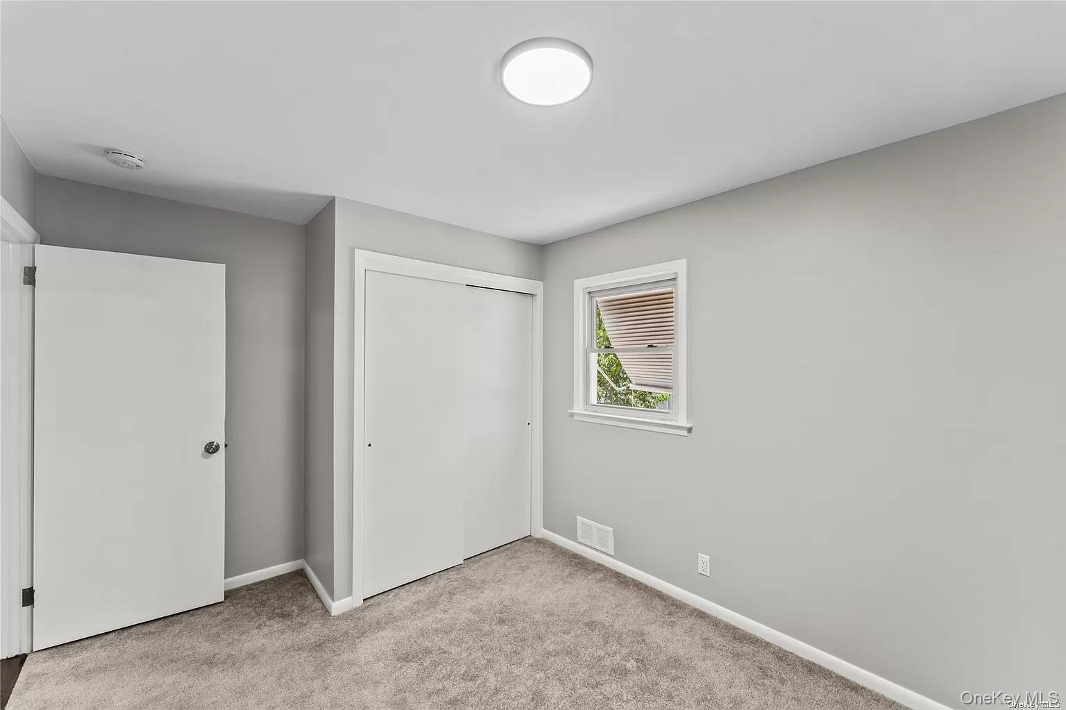 6 Valley View Terrace Suffern, NY 10901 - Photo 12 of 19 a view of an empty room with a window