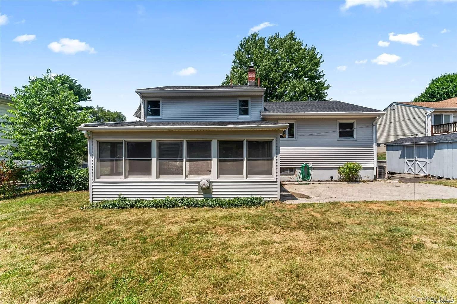 6 Valley View Terrace Suffern, NY 10901 - Photo 18 of 19 a front view of a house with a yard