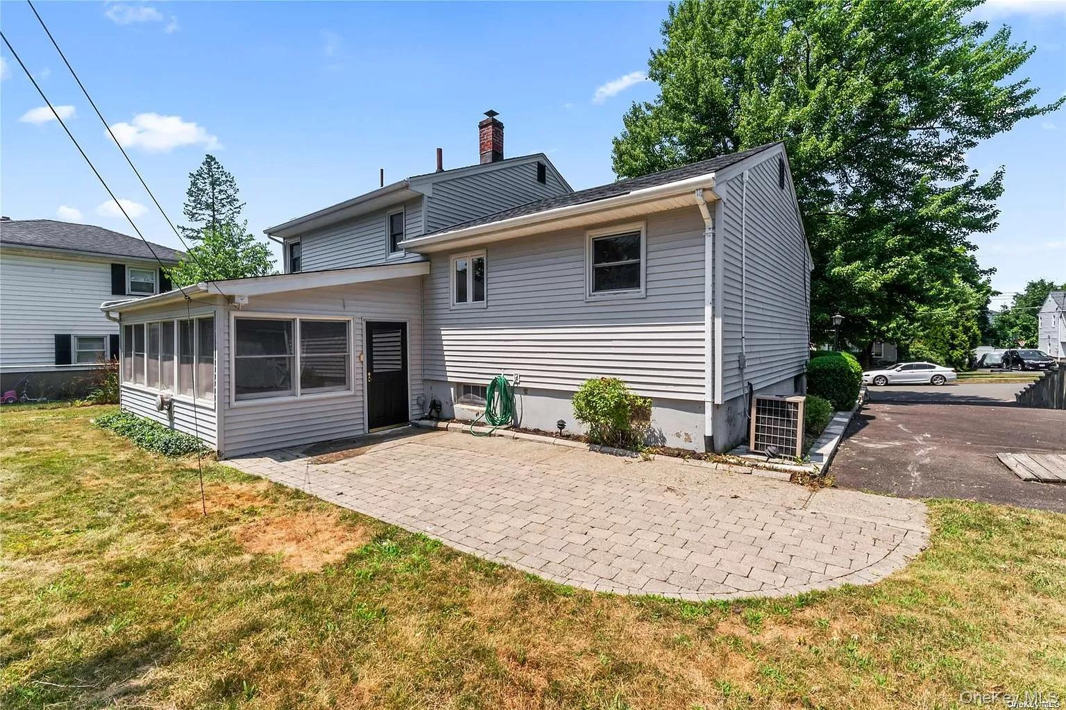 6 Valley View Terrace Suffern, NY 10901 - Photo 19 of 19 a front view of a house with a yard