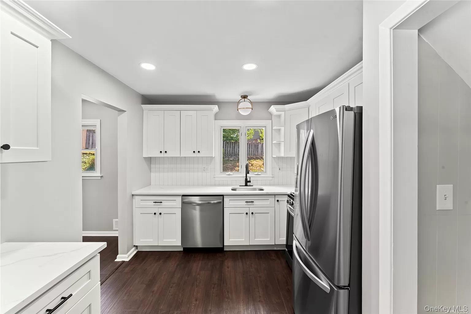 6 Valley View Terrace Suffern, NY 10901 - Photo 5 of 19 a kitchen with stainless steel appliances a sink a stove a refrigerator and cabinets