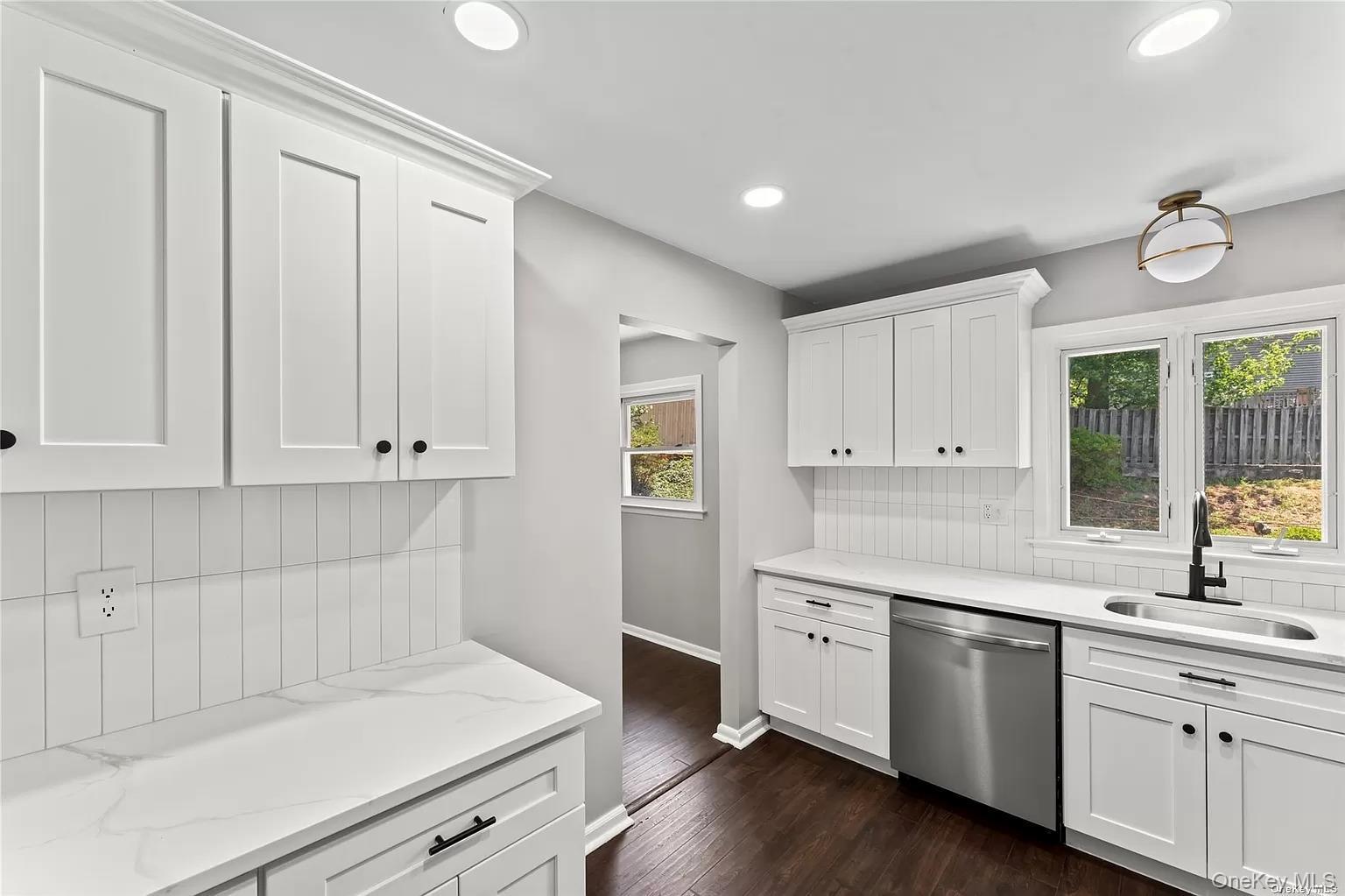 6 Valley View Terrace Suffern, NY 10901 - Photo 6 of 19 a kitchen with white cabinets and sink