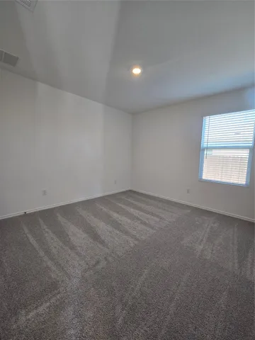 a bathroom with a double vanity sink toilet and shower