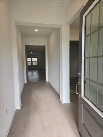 wooden floor and window in a room