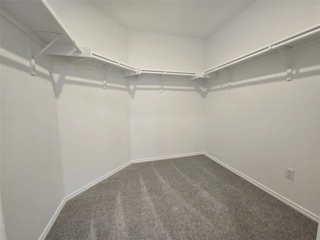 a view of a walk in closet