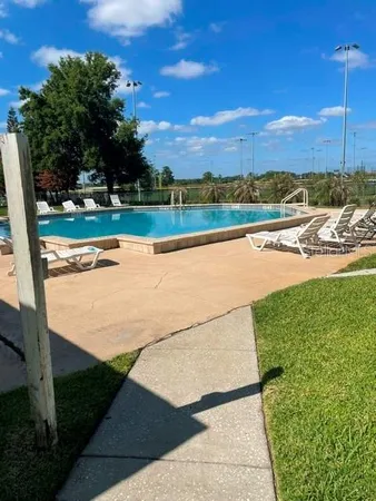 a view of a lake with a big yard