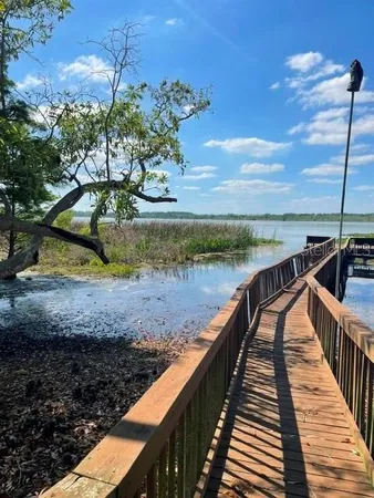 a view of a lake with a deck
