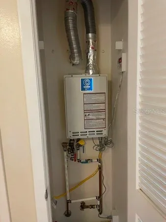 a hallway with storage and utility