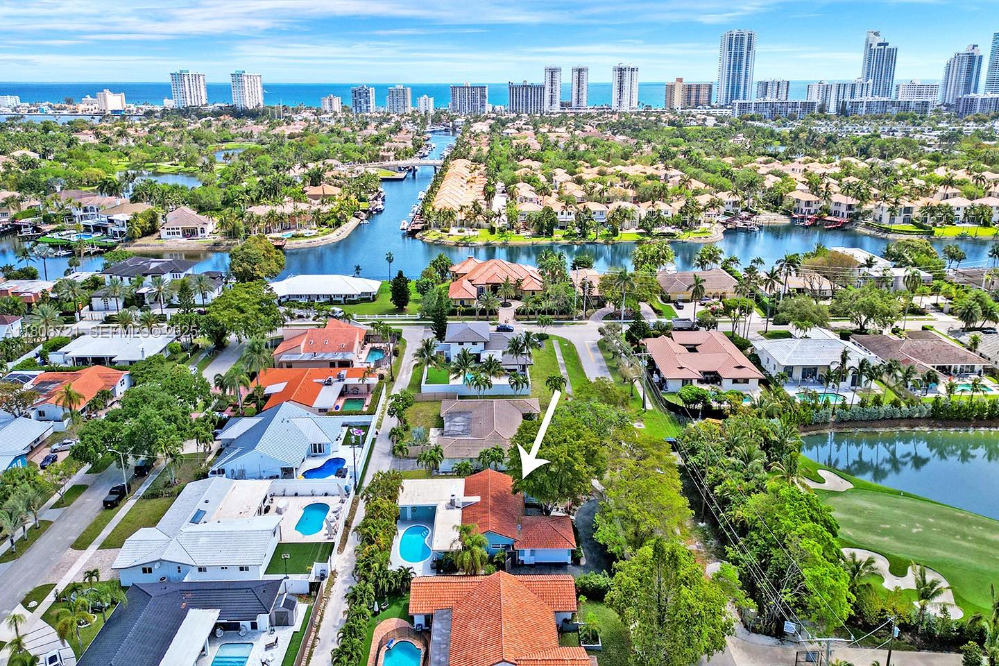 1245 Wiley Street Hollywood, FL 33019 - Photo 2 of 43 a view of a city