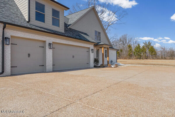 5392 Grayson Way Hernando, MS 38632 - Photo 4 of 32 74-side view