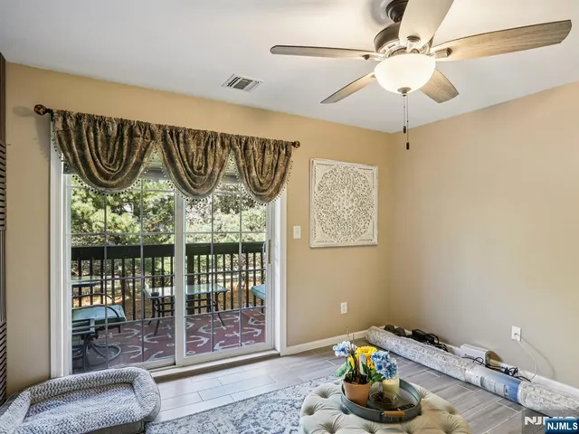 a balcony with wooden floor