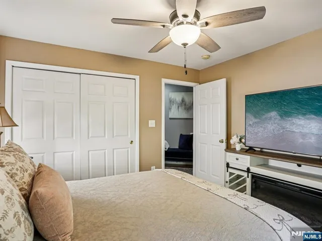 a room with furniture and a flat screen tv