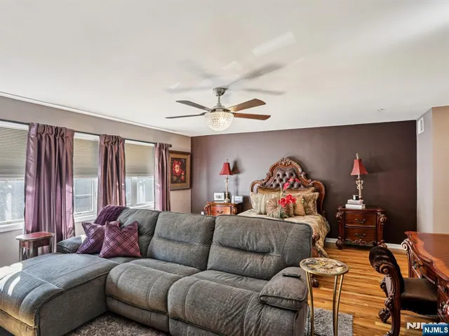 a bathroom with a sink mirror and toilet