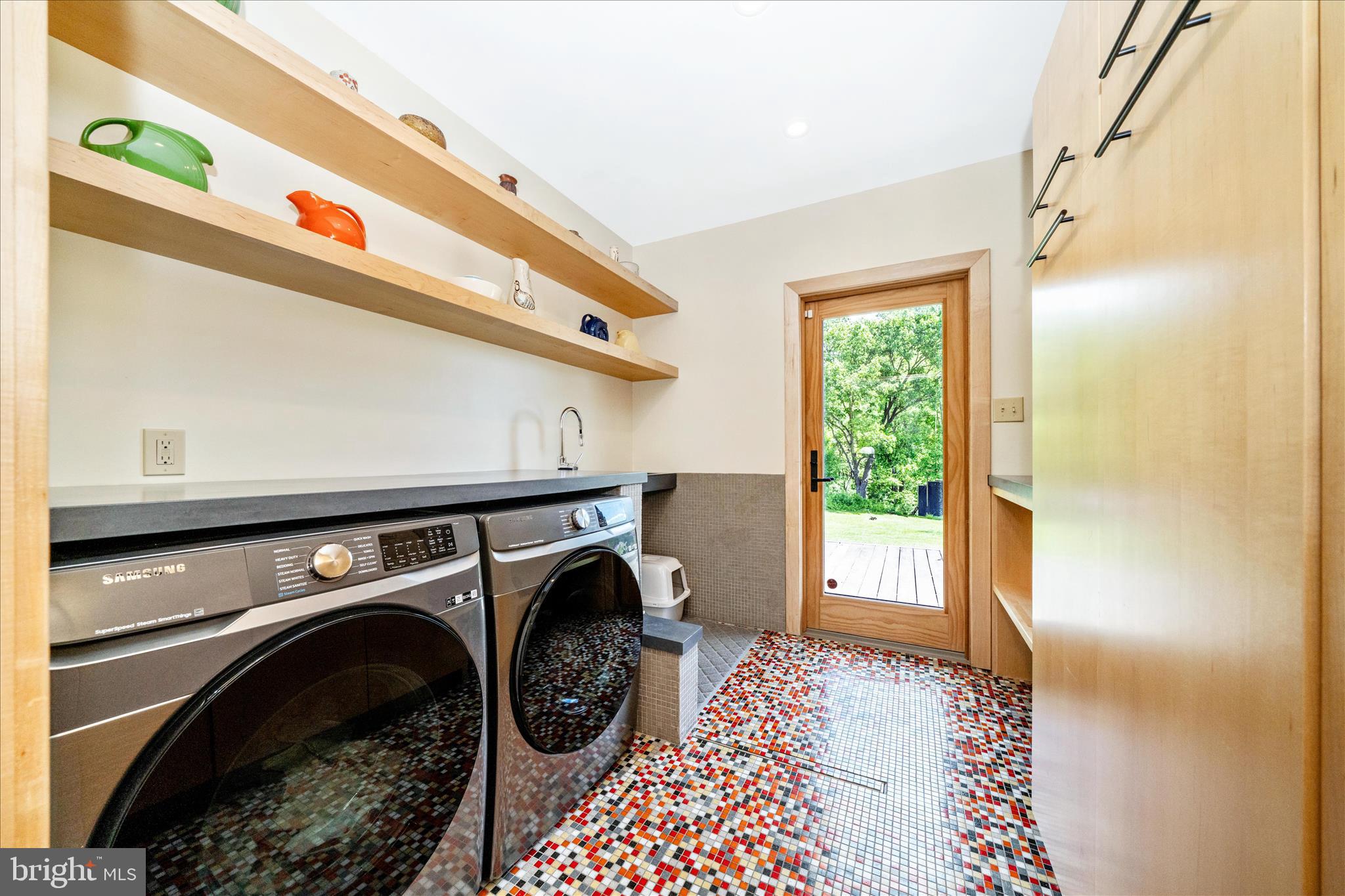 9237 Frostown Road Middletown, MD 21769 - Photo 32 of 113 Laundry Room has a wet floor and hidden shelving