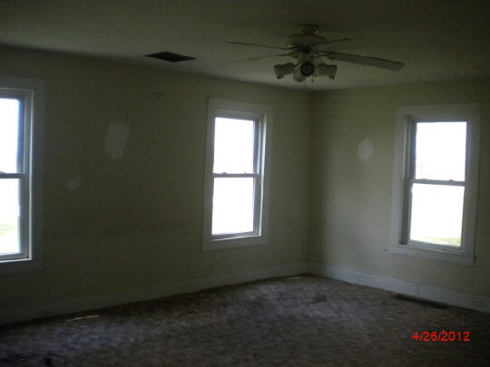 1212 Fisk Road Compton, IL 61318 - Photo 4 of 10 an empty room with a window