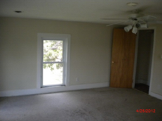 1212 Fisk Road Compton, IL 61318 - Photo 7 of 10 an empty room with a window
