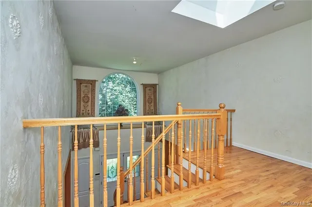 a view of entryway with wooden floor