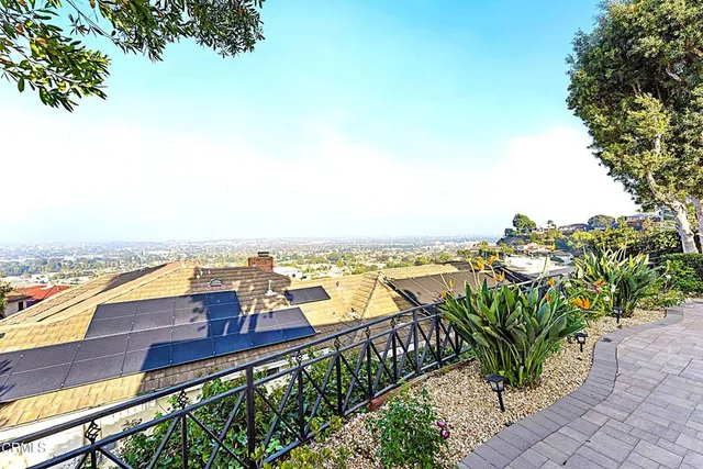 a view of a city with an ocean view