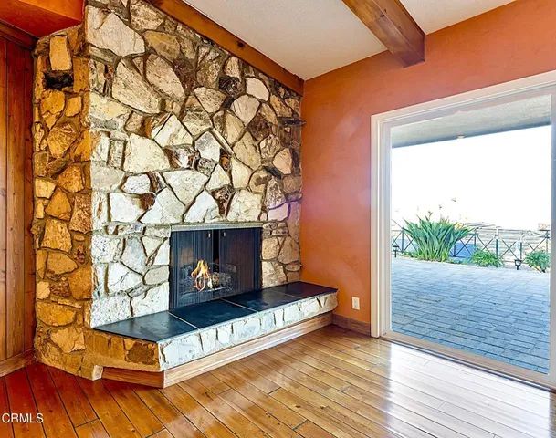 a living room with a fireplace