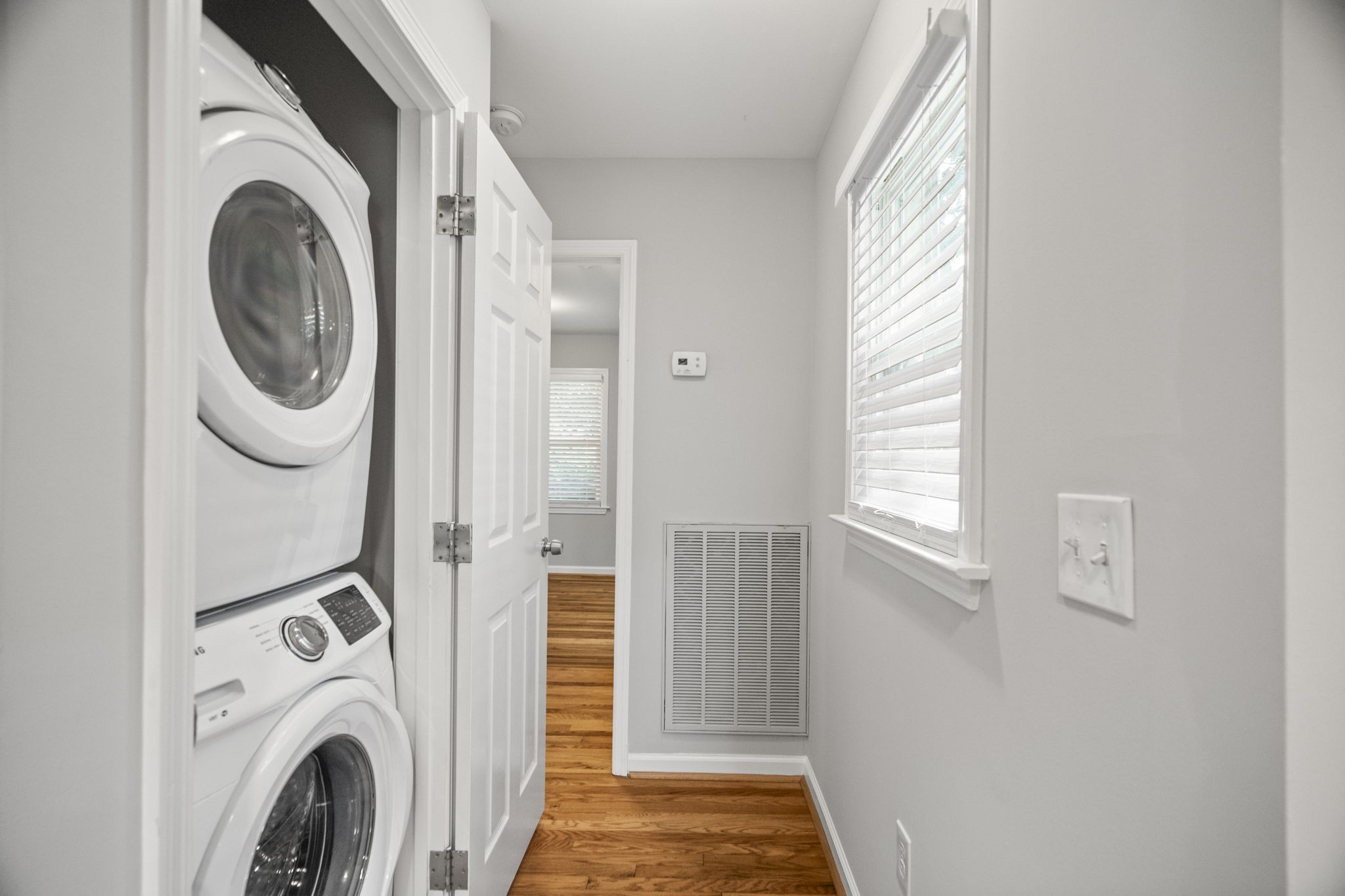 202 Cherokee Road Nashville, TN 37205 - Photo 14 of 35 a view of a hallway with washer and dryer