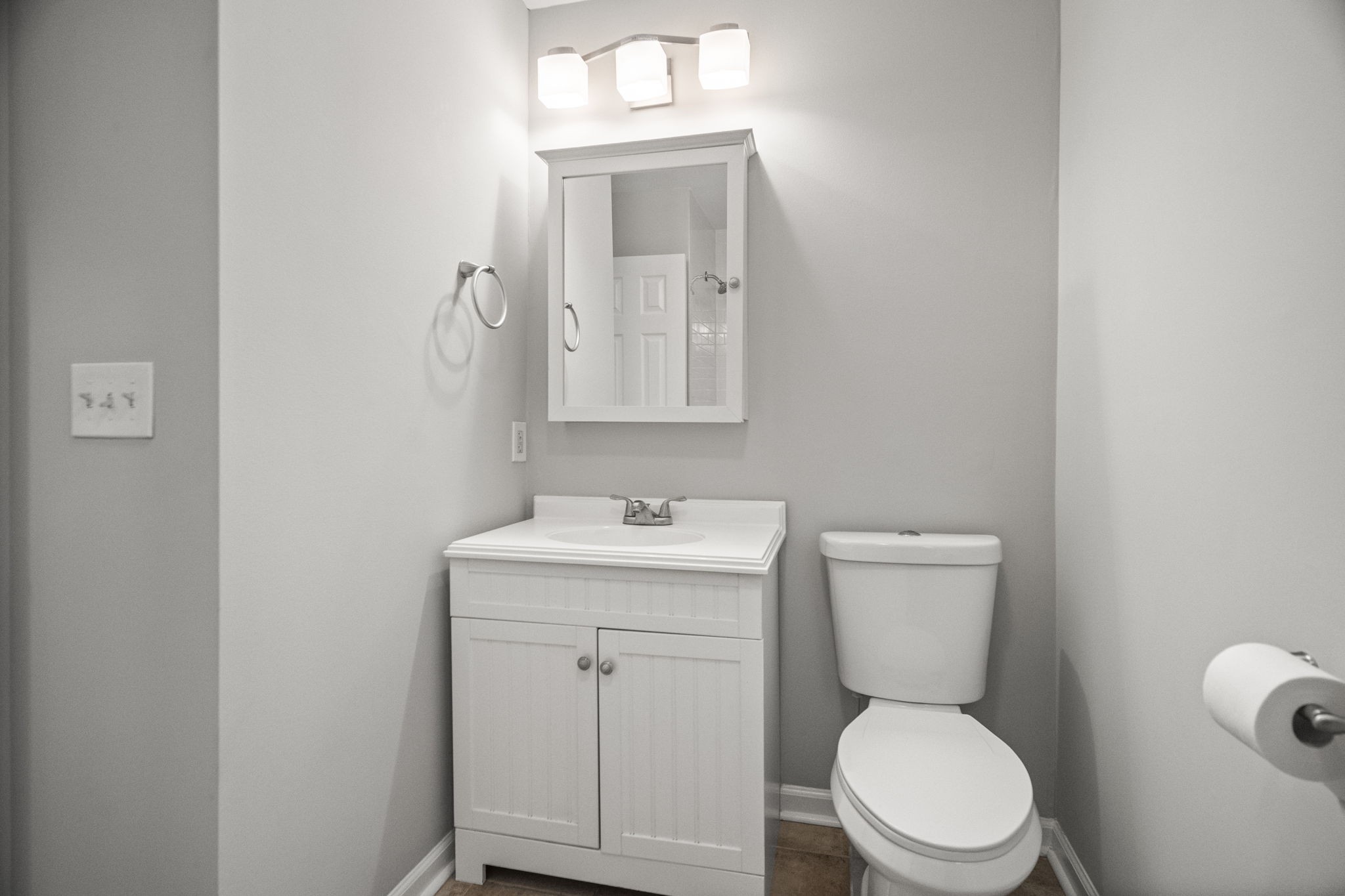 202 Cherokee Road Nashville, TN 37205 - Photo 17 of 35 a bathroom with a toilet a sink and mirror