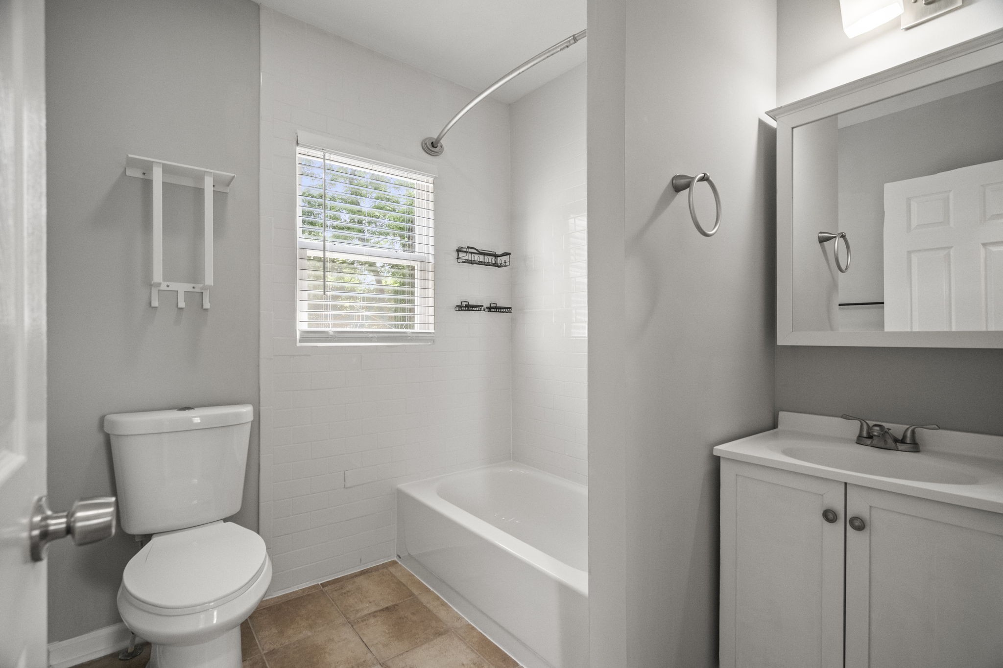 202 Cherokee Road Nashville, TN 37205 - Photo 29 of 35 a white toilet sitting next to a bathroom sink
