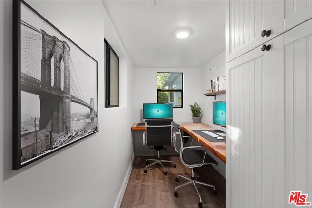 a utility room with sink dryer and washer