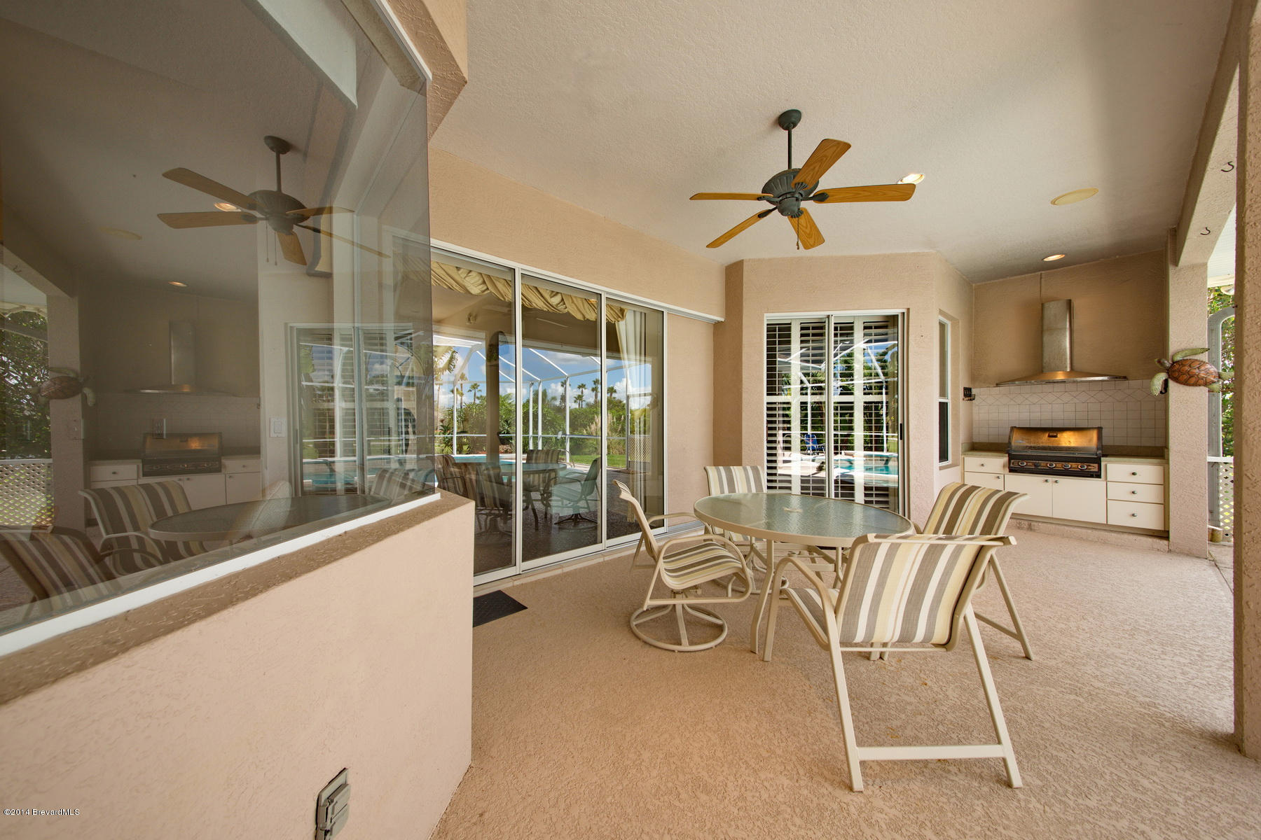 4230 Stoney Point Road, Unit SUNTREE Melbourne, FL 32940 - Photo 14 of 40 Covered Patio_Built-in BBQ