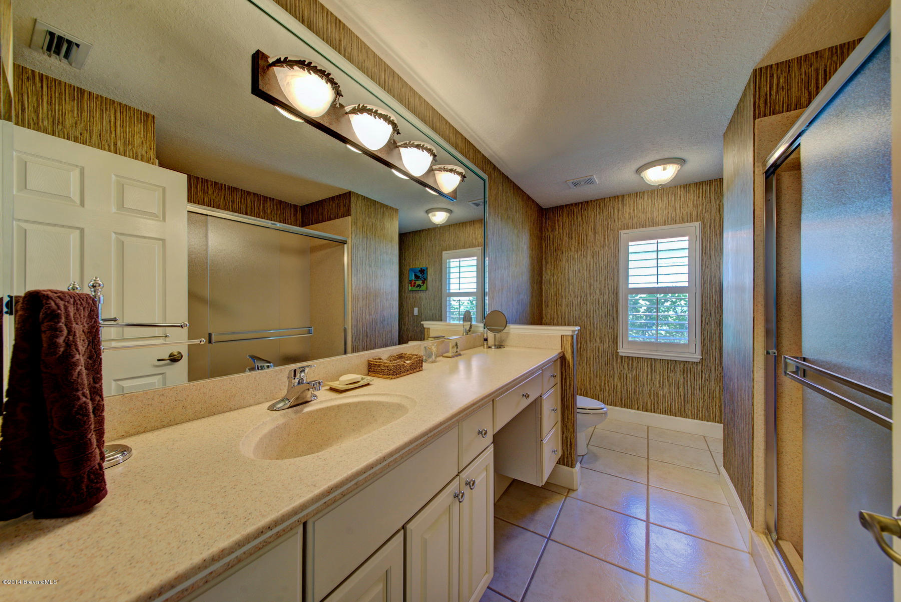4230 Stoney Point Road, Unit SUNTREE Melbourne, FL 32940 - Photo 29 of 40 Bathroom2