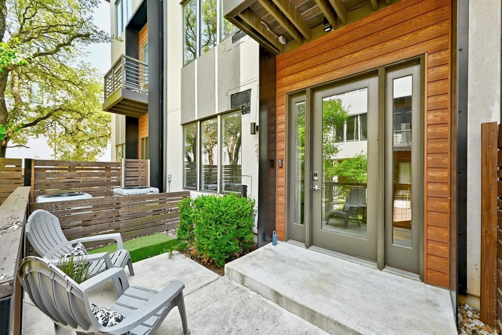 a view of balcony with furniture