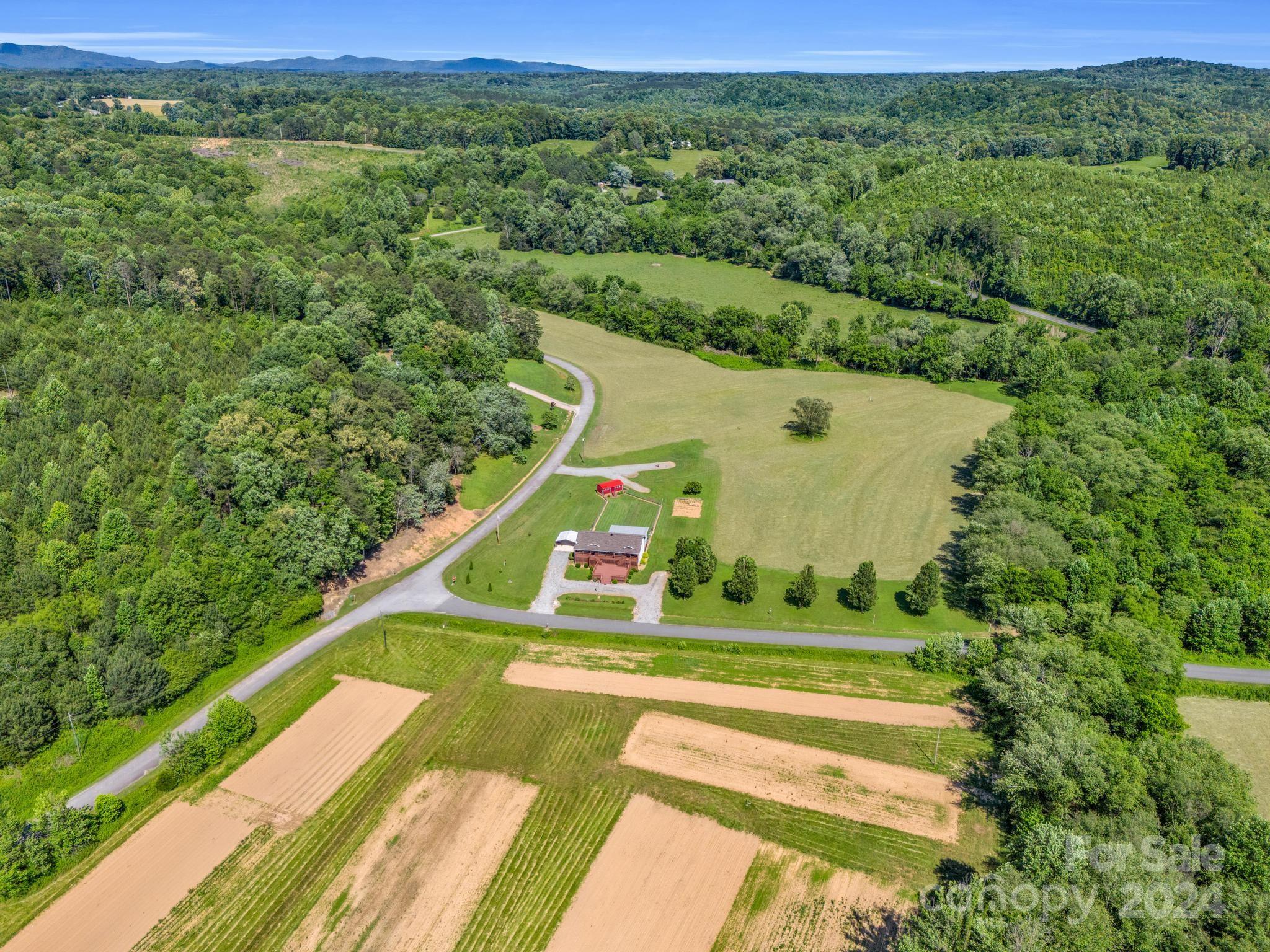 202 Mogene Road Rutherfordton, NC 28139 - Photo 16 of 40 a view of a field with a park