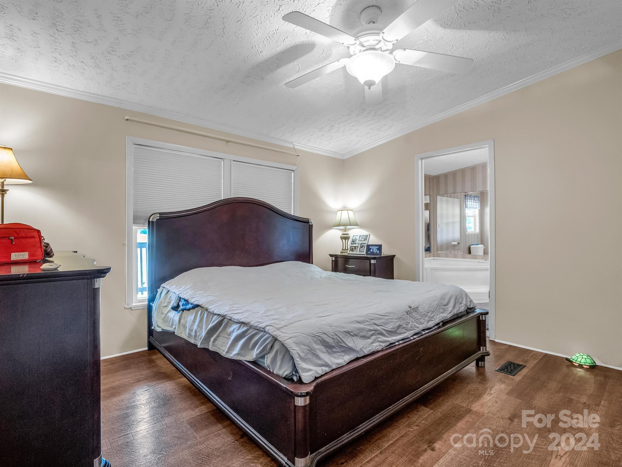 202 Mogene Road Rutherfordton, NC 28139 - Photo 22 of 40 a bedroom with a bed and window