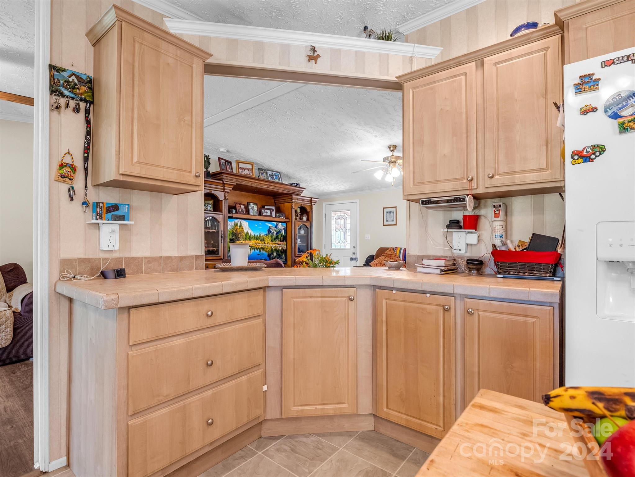 202 Mogene Road Rutherfordton, NC 28139 - Photo 29 of 40 a kitchen with cabinets appliances and a sink