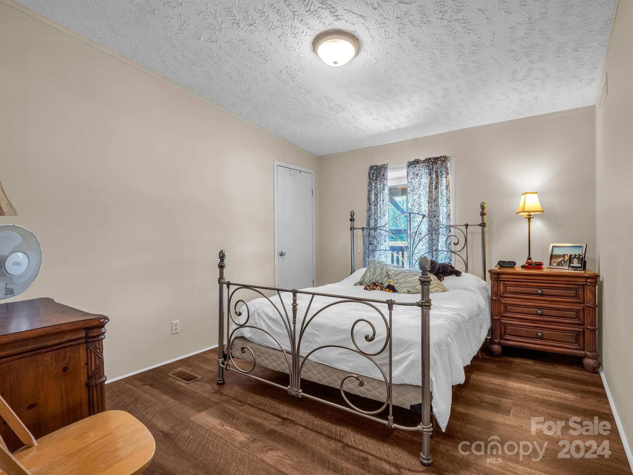202 Mogene Road Rutherfordton, NC 28139 - Photo 35 of 40 a bedroom with bed and a window