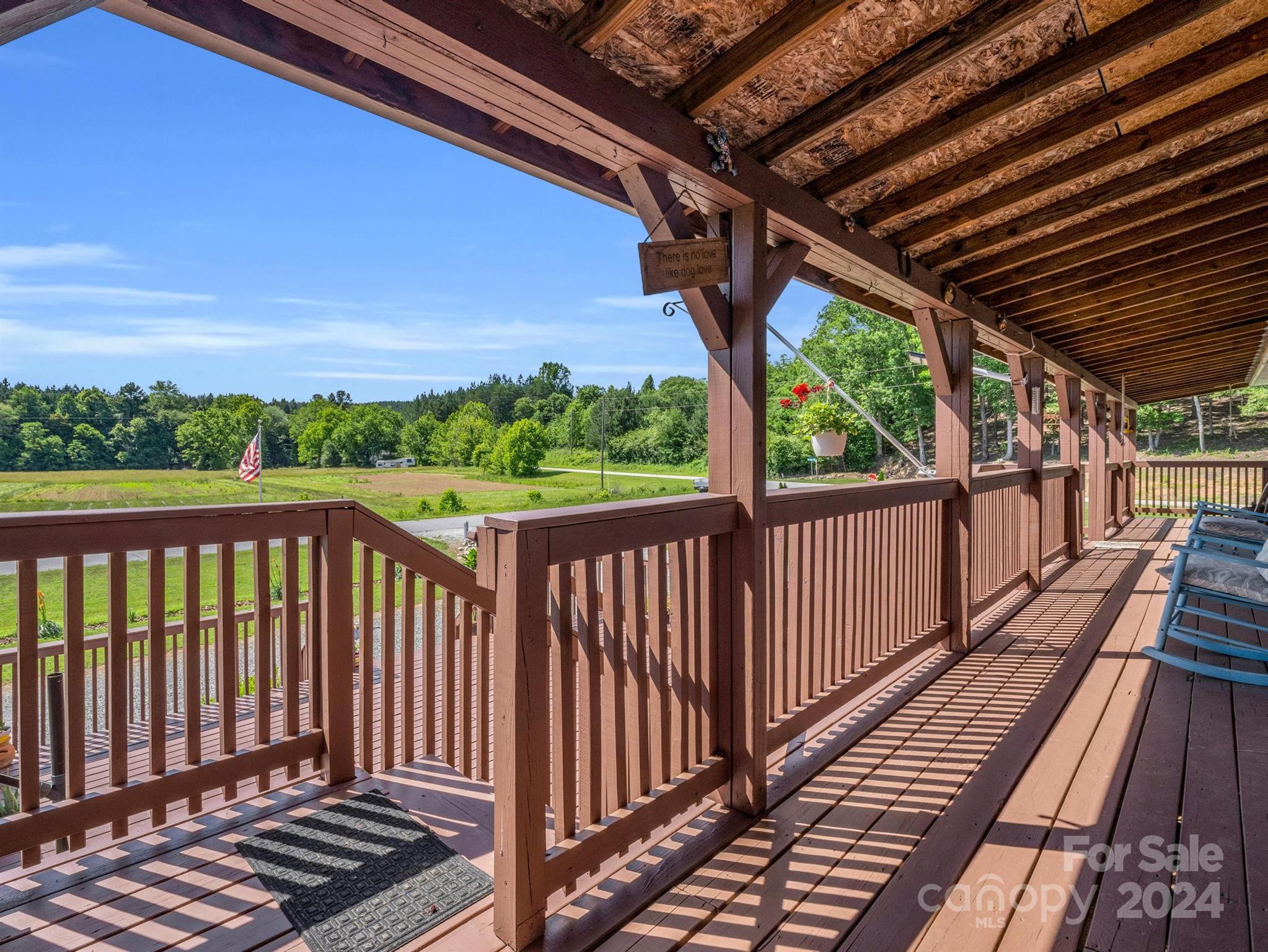 202 Mogene Road Rutherfordton, NC 28139 - Photo 36 of 40 a view of a balcony with wooden floor