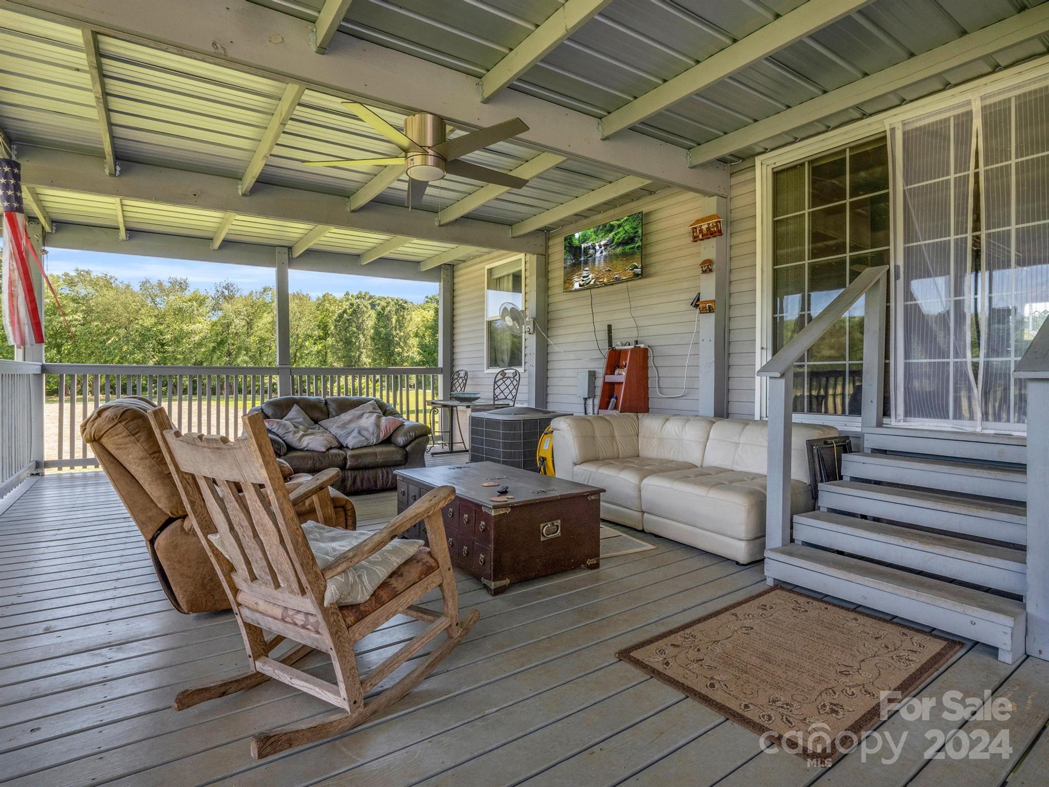 202 Mogene Road Rutherfordton, NC 28139 - Photo 40 of 40 a building outdoor space with patio furniture