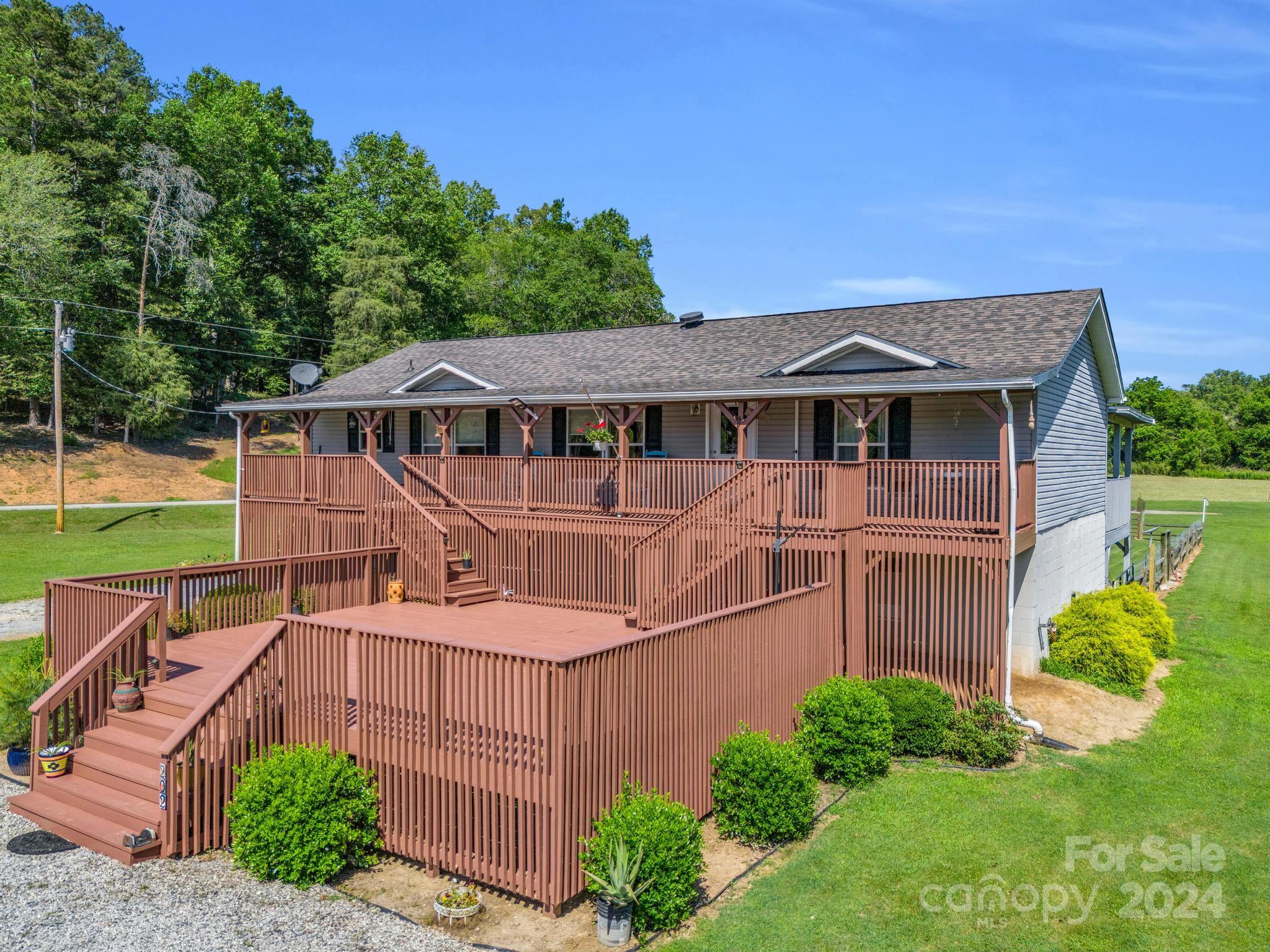 202 Mogene Road Rutherfordton, NC 28139 - Photo 4 of 40 a view of a house with a yard
