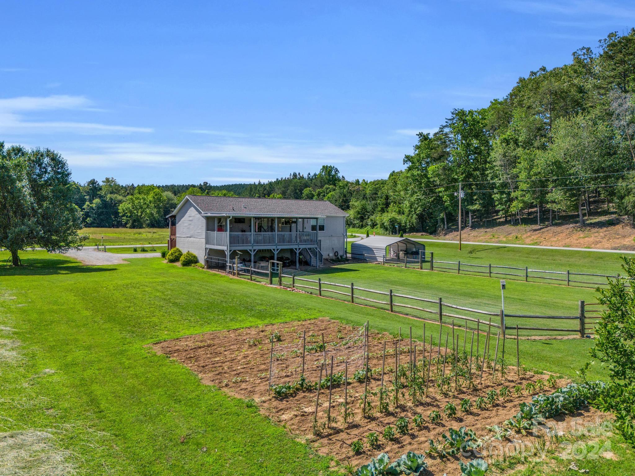 202 Mogene Road Rutherfordton, NC 28139 - Photo 5 of 40 a view of a house with a big yard