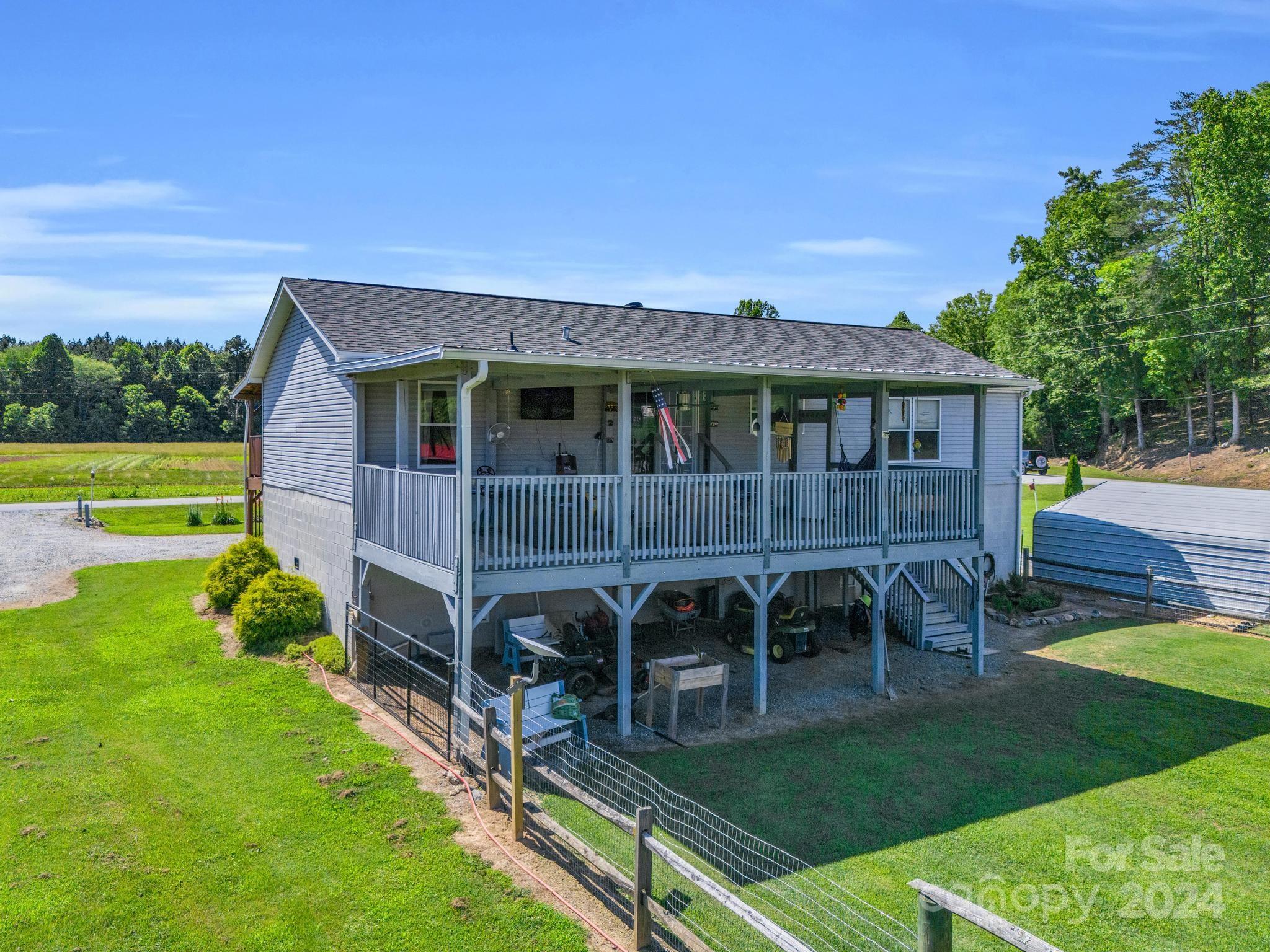 202 Mogene Road Rutherfordton, NC 28139 - Photo 6 of 40 a view of a house with a yard
