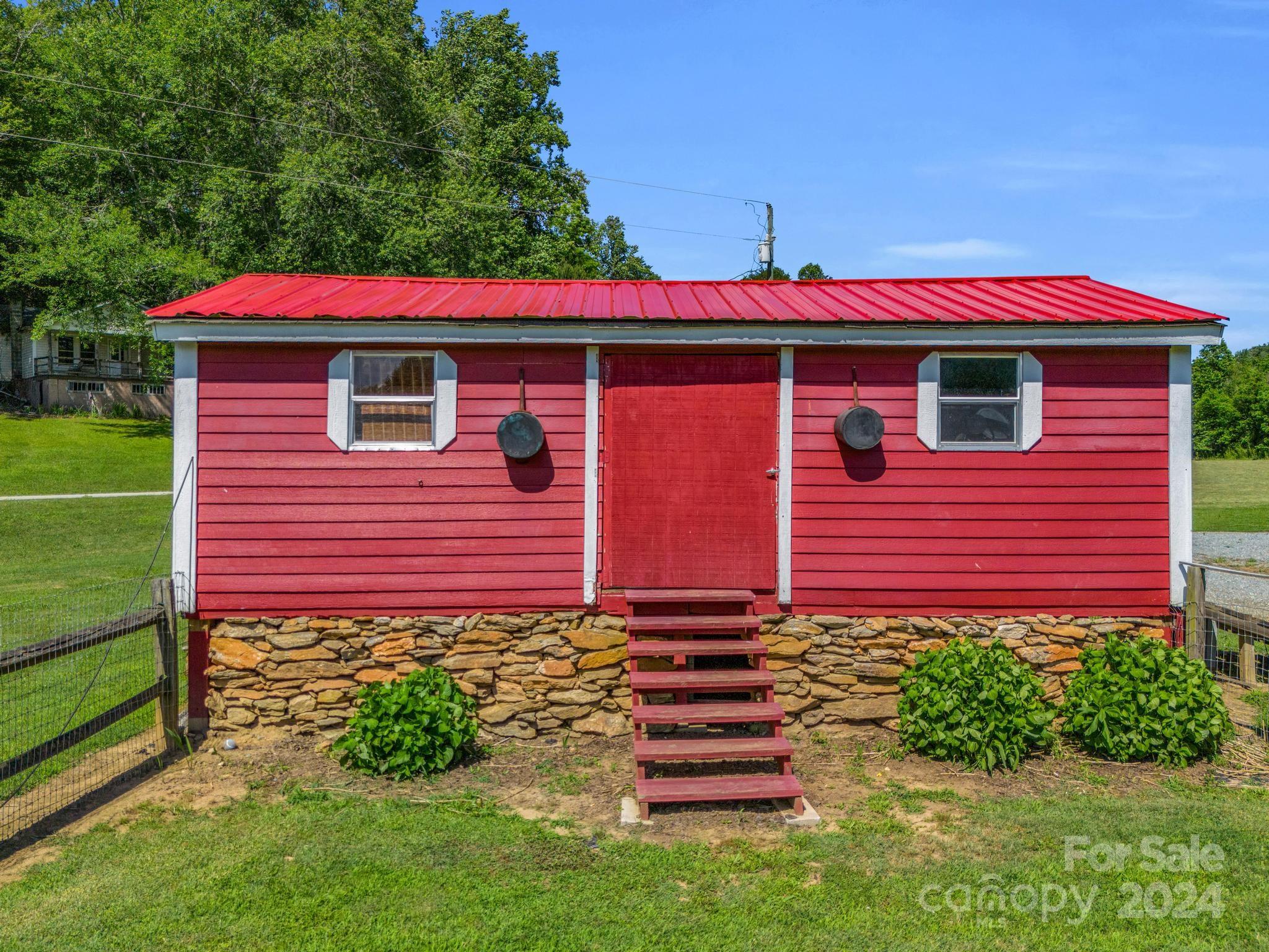 202 Mogene Road Rutherfordton, NC 28139 - Photo 7 of 40 a front view of a house with a yard