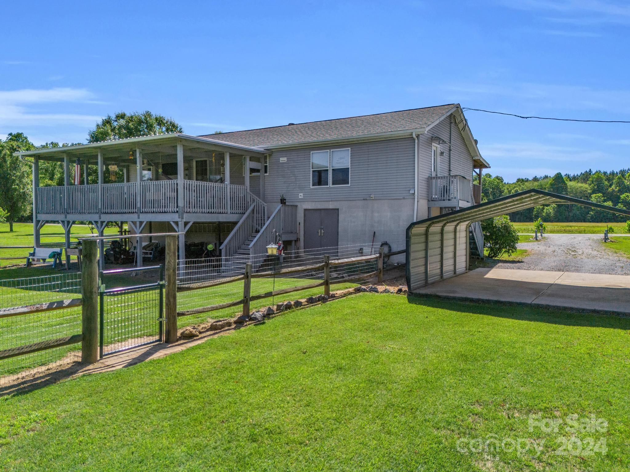 202 Mogene Road Rutherfordton, NC 28139 - Photo 9 of 40 a view of house with swimming pool yard and outdoor seating