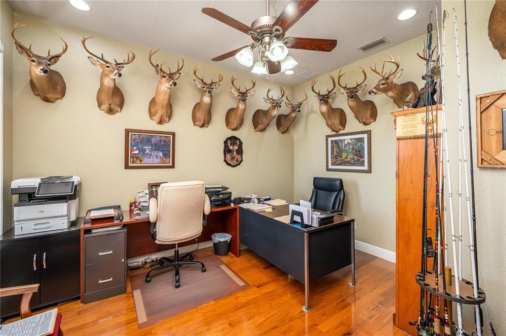 35 Stembridge Road Lake Wales, FL 33898 - Photo 42 of 61 a view of a workspace with furniture and a window