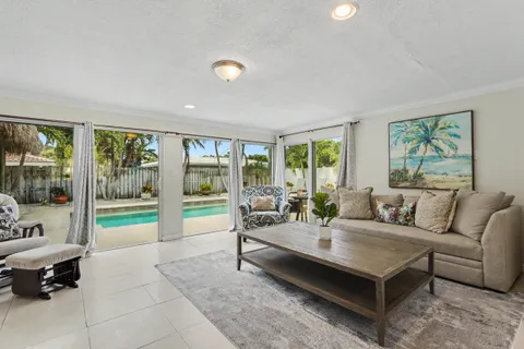 a view of a swimming pool with lounge chair