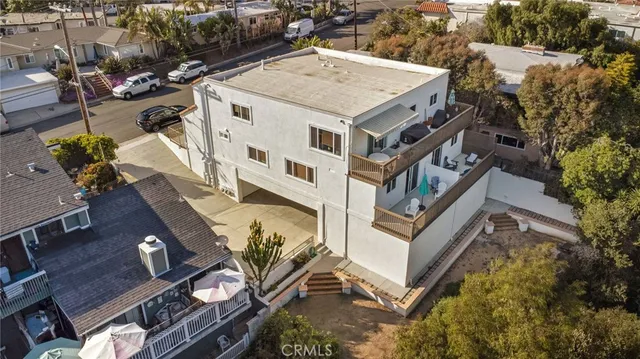 a view of a house with a street