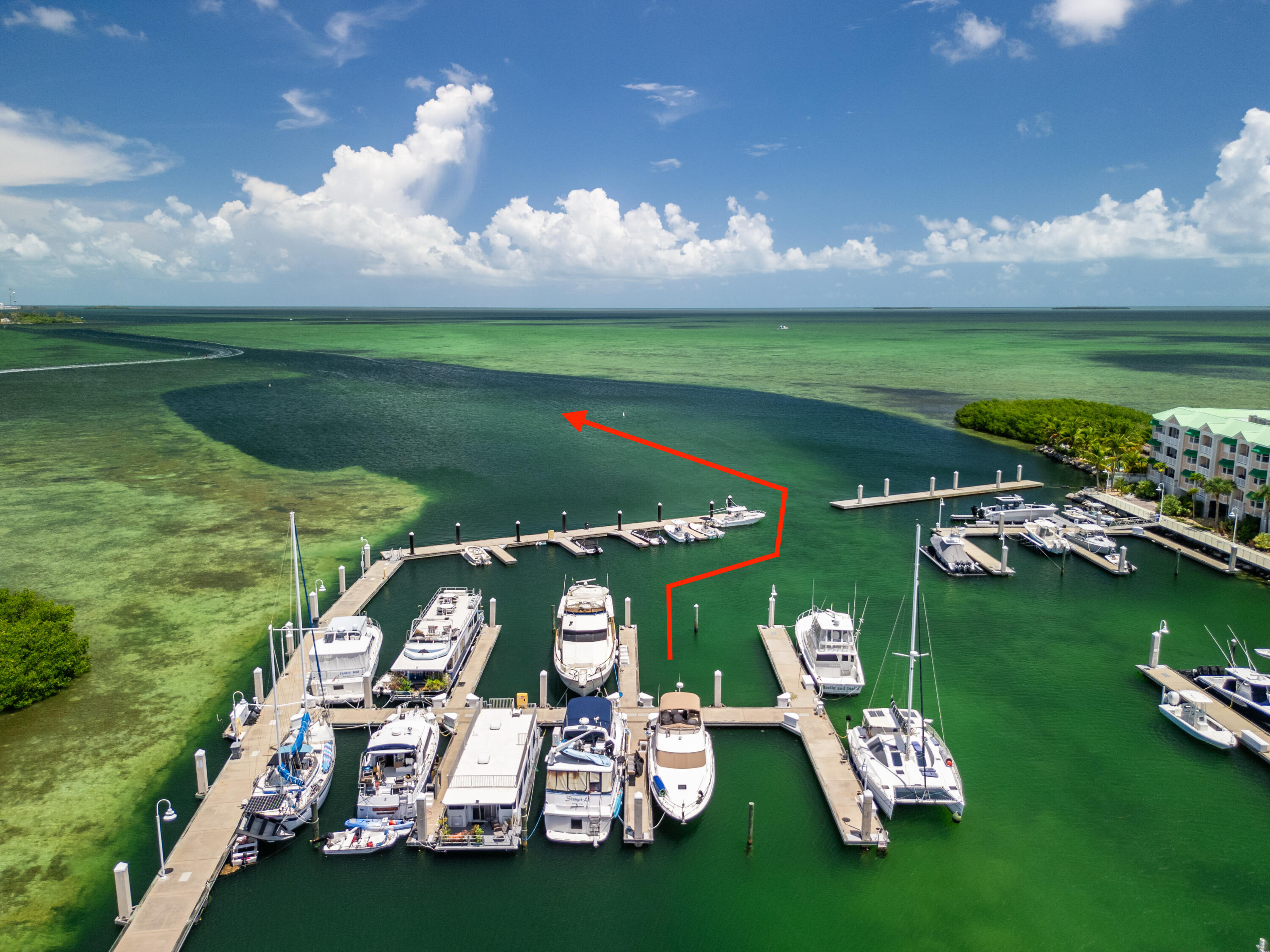 a view of a golf course with chairs
