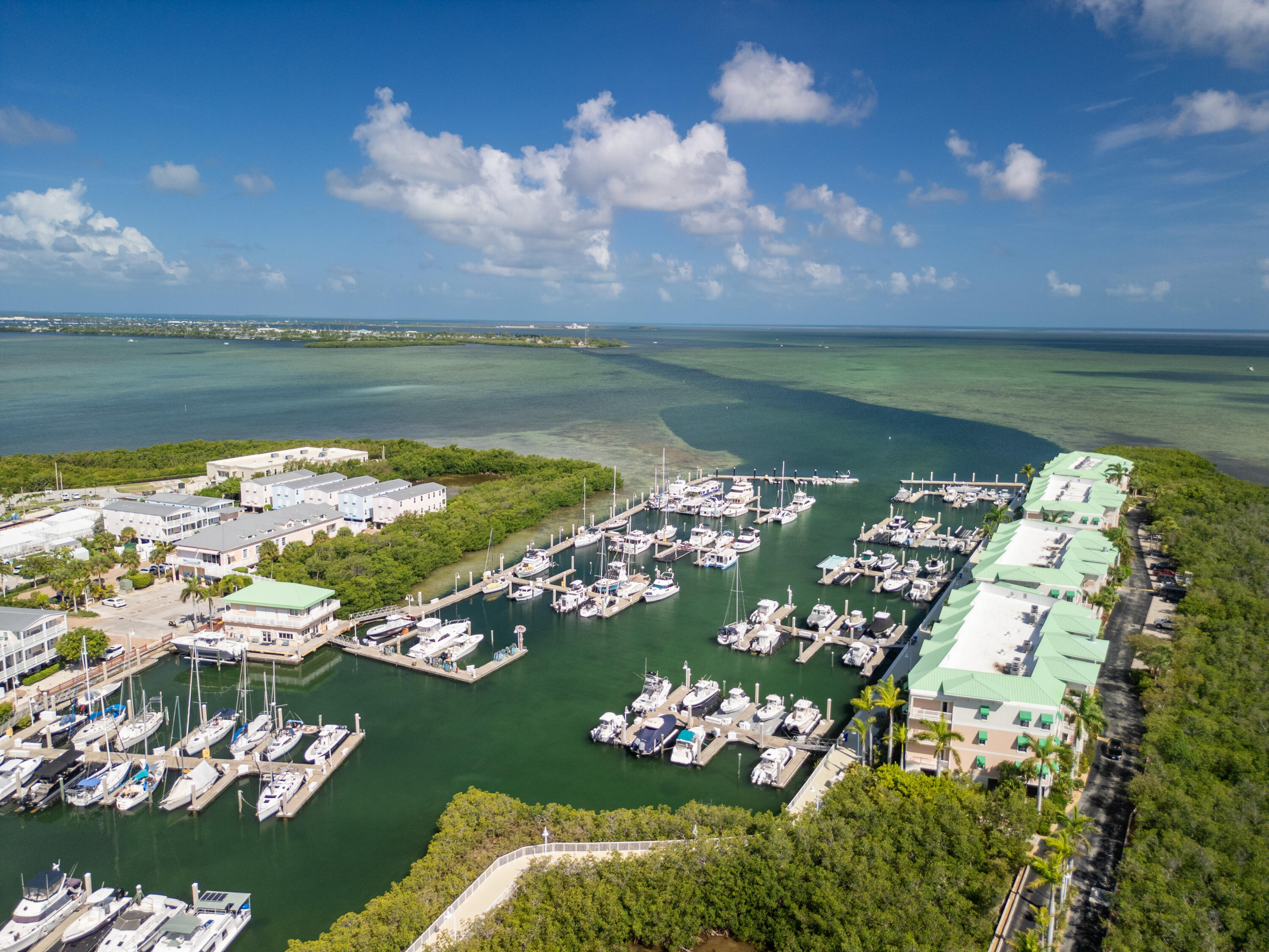5555 College Road, Unit BARRACUDA #9 Key West, FL 33040 - Photo 11 of 18 a view of a lake with a big yard