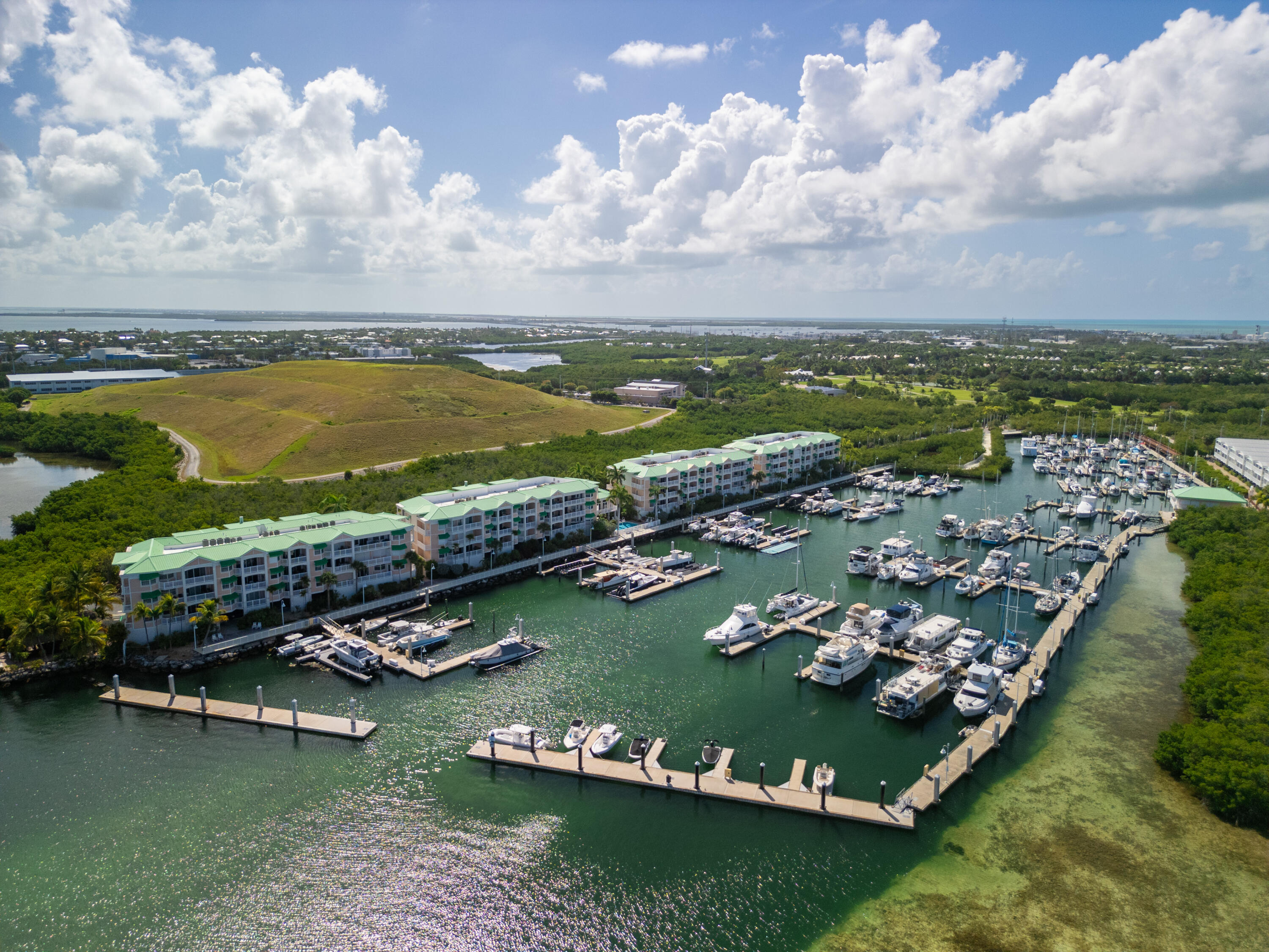 5555 College Road, Unit BARRACUDA #9 Key West, FL 33040 - Photo 12 of 18 an aerial view of a city with a lake