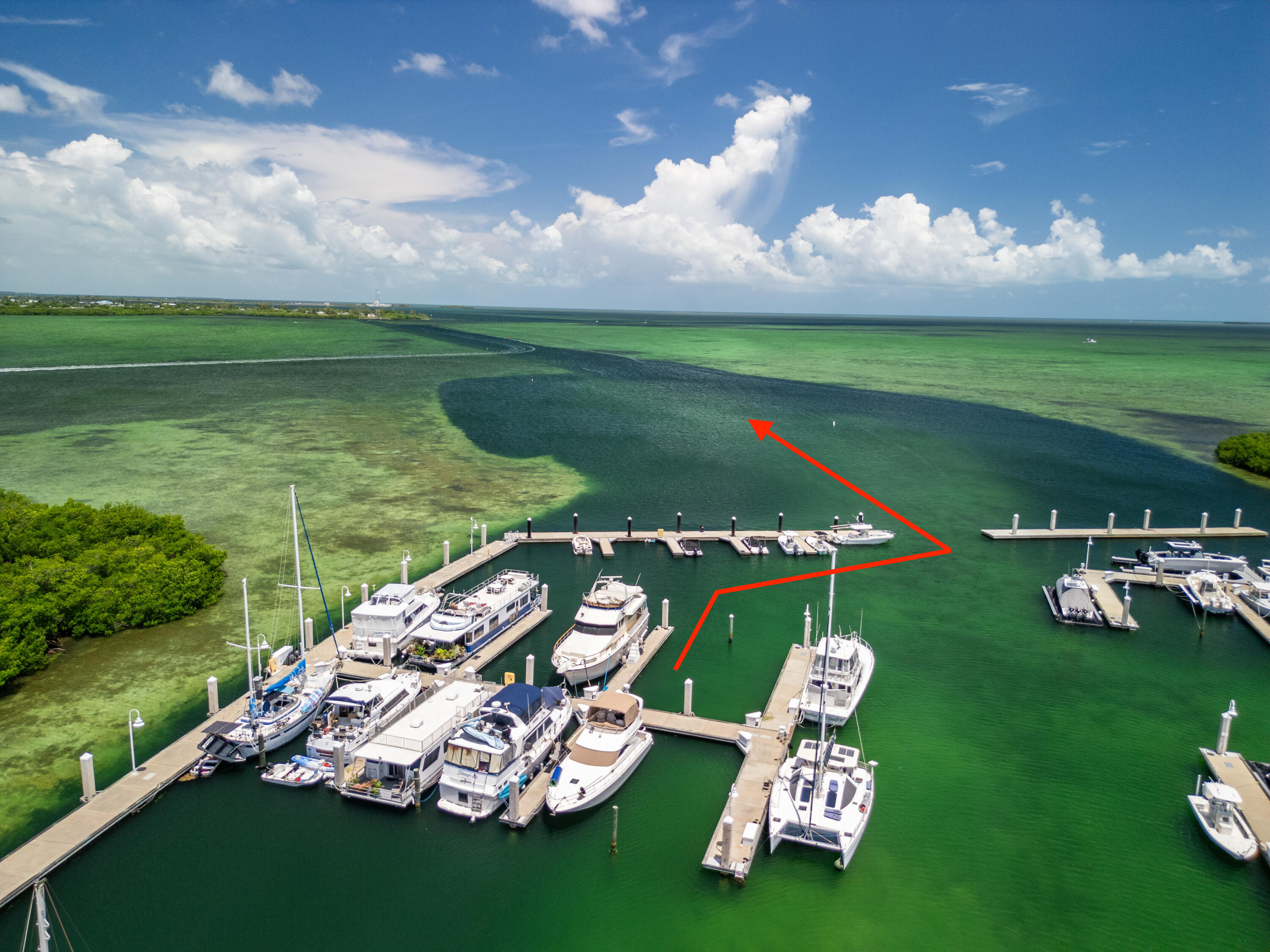 5555 College Road, Unit BARRACUDA #9 Key West, FL 33040 - Photo 5 of 18 a view of a golf course with chairs
