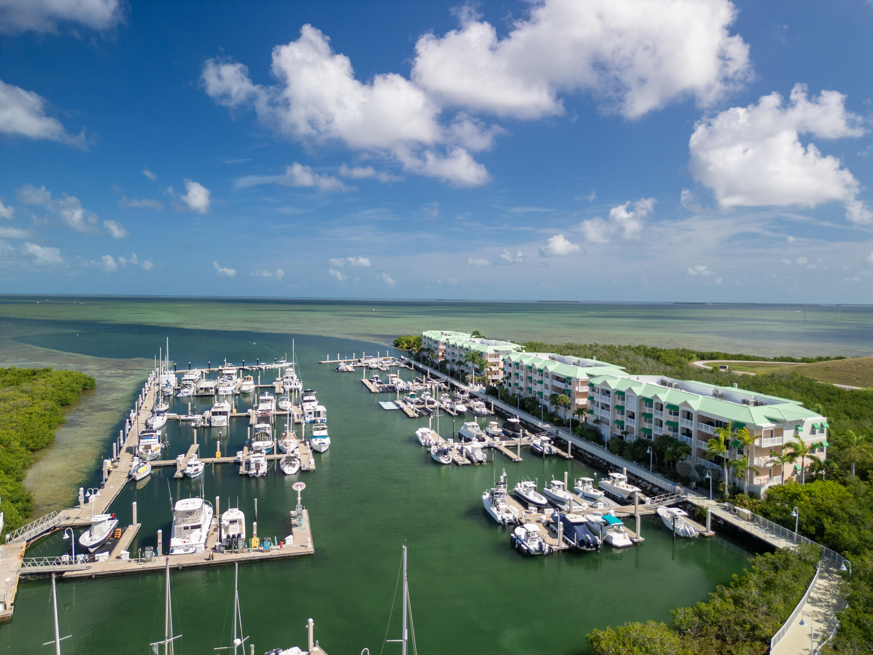 5555 College Road, Unit BARRACUDA #9 Key West, FL 33040 - Photo 8 of 18 a view of a house with a big yard