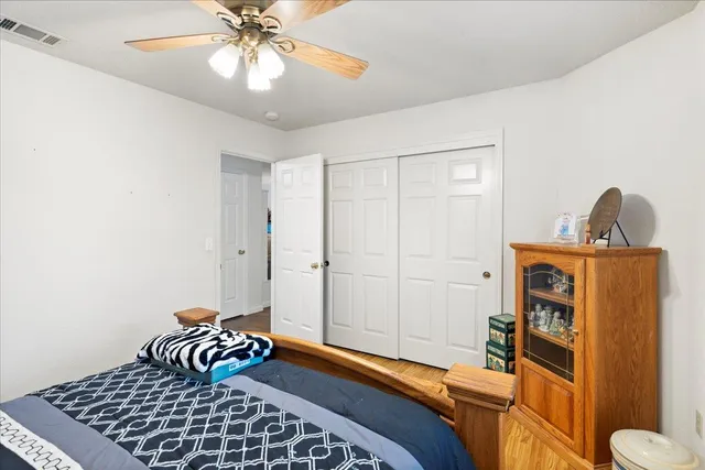 a en suite bedroom with bed and window